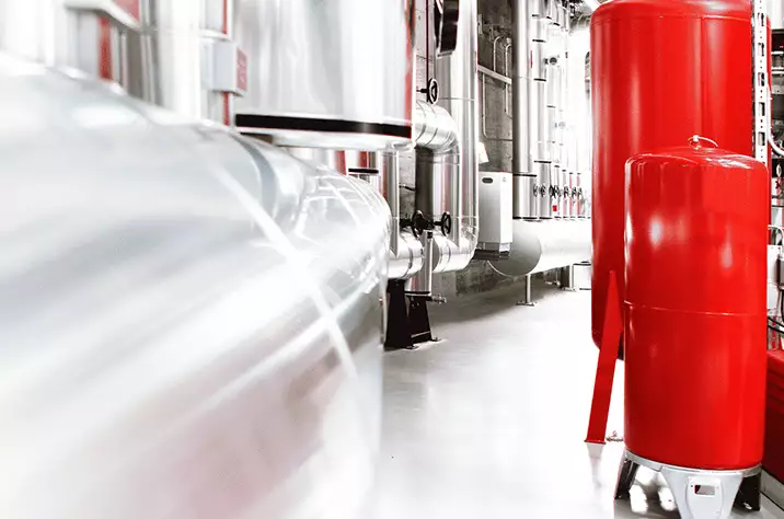 image of a boiler room with temporary meters installed to check for accuracy