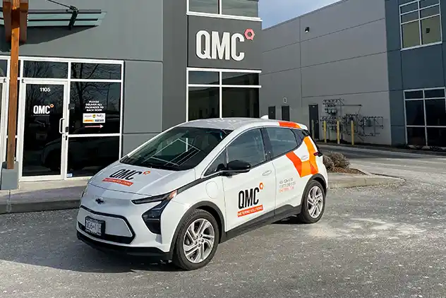 image of company Bolt EV in front of QMC's Port Coquitlam office